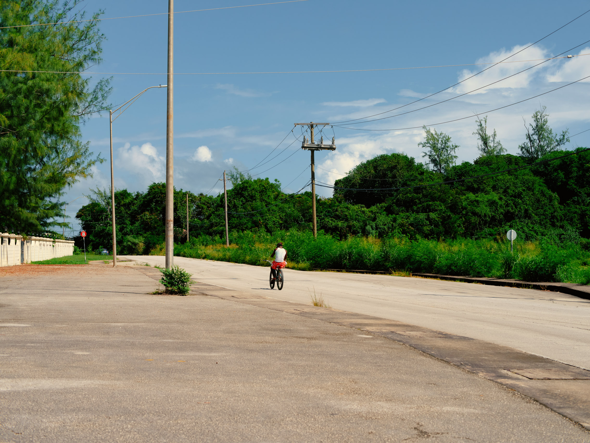 A-LONE-CYCLIST-ON-A-LONELY-ROAD-IN-BARBADOS-