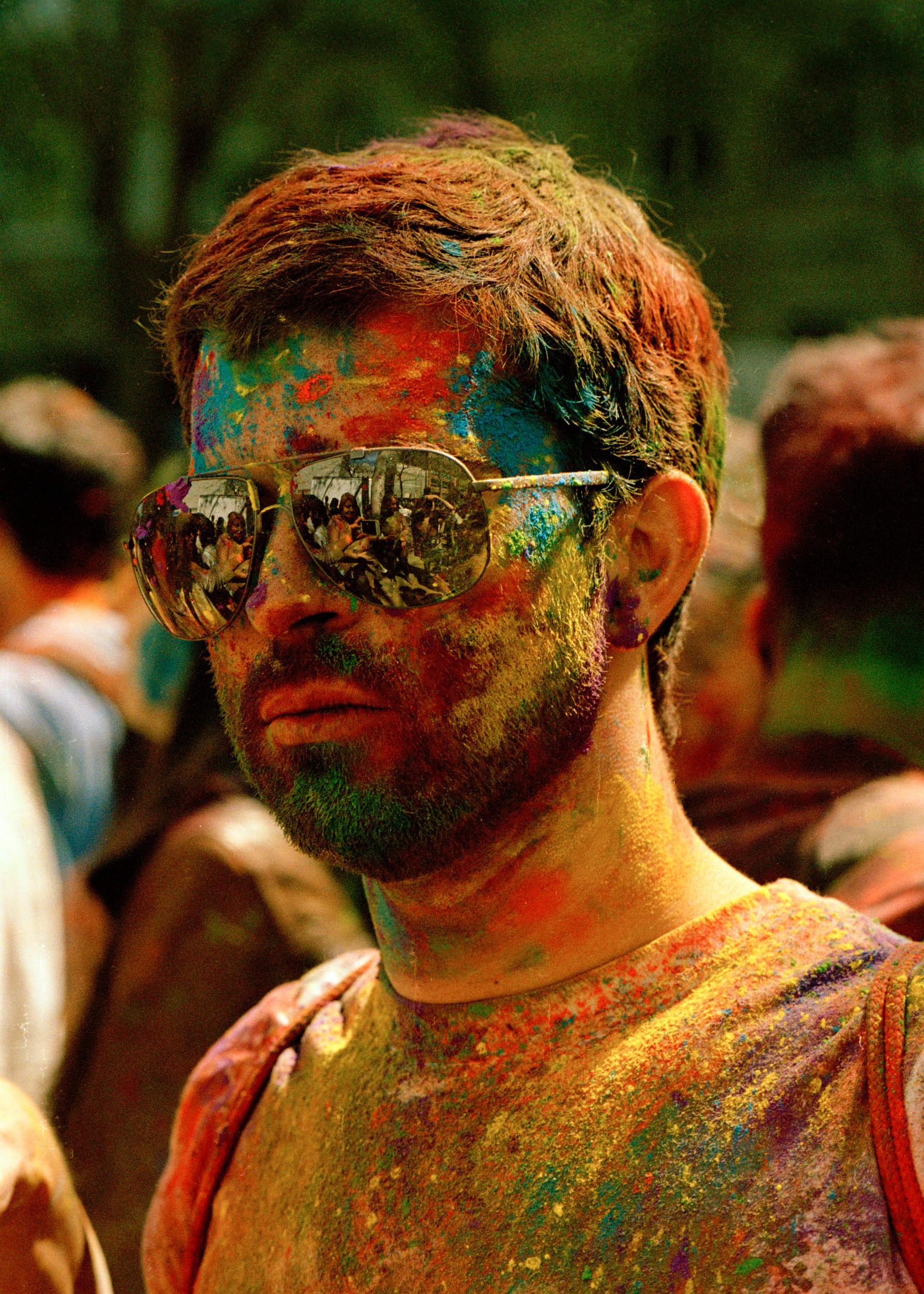 FACE DECORATED WITH COLOR - HOLI FESTIVAL