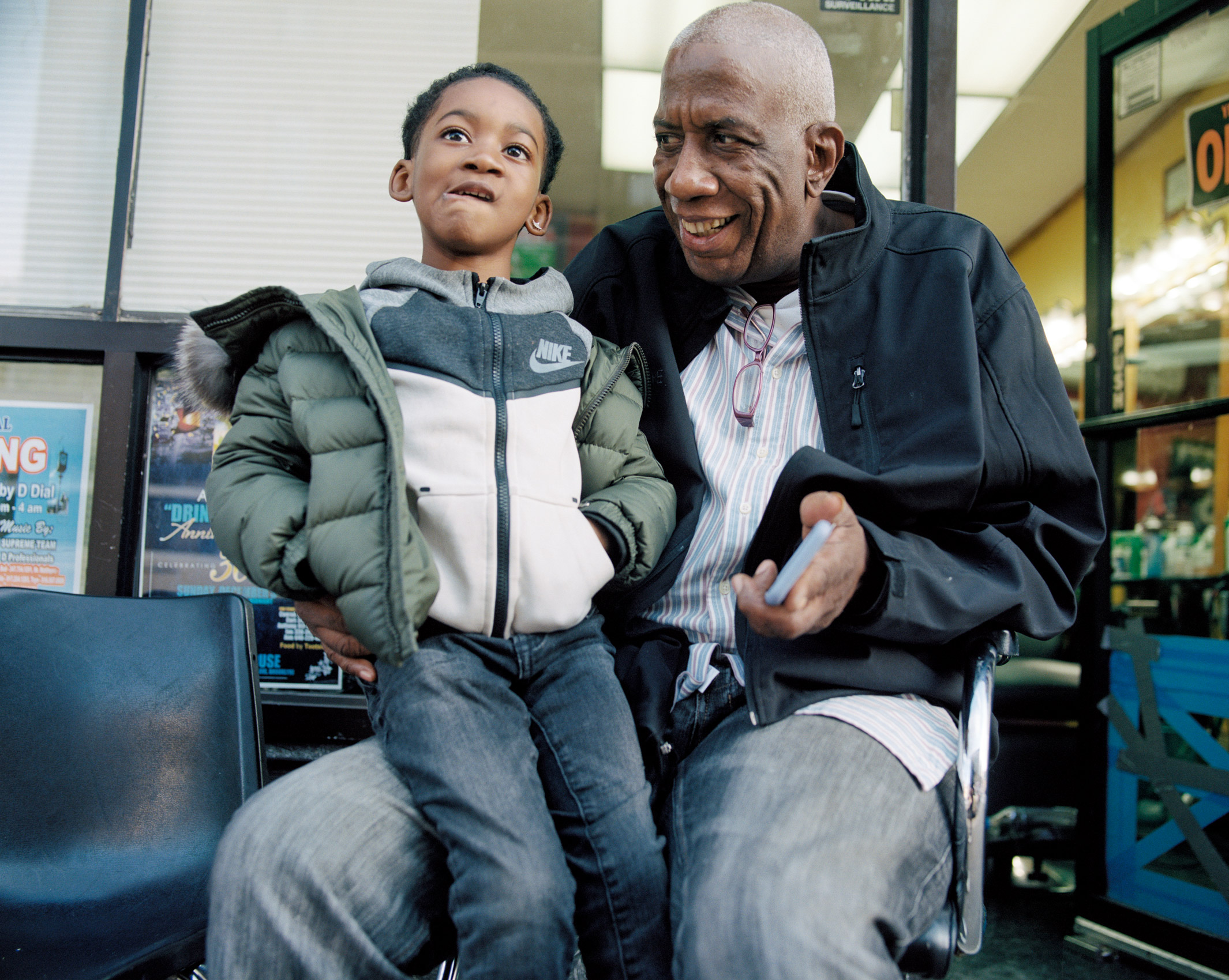 GRANDFATHER AND SON IN CROWN HEIGHTS