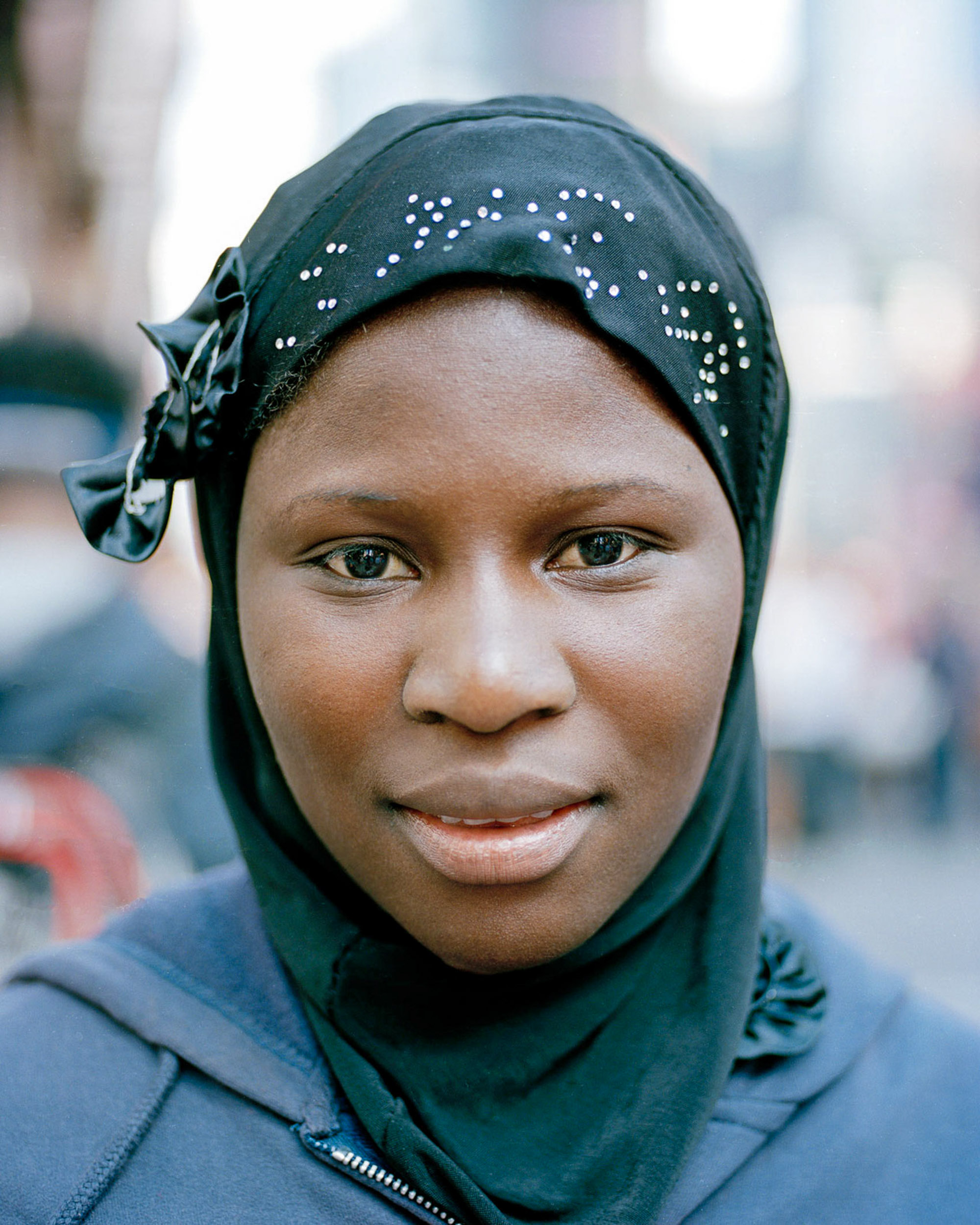 A street portrait of a woman in Times Square New York