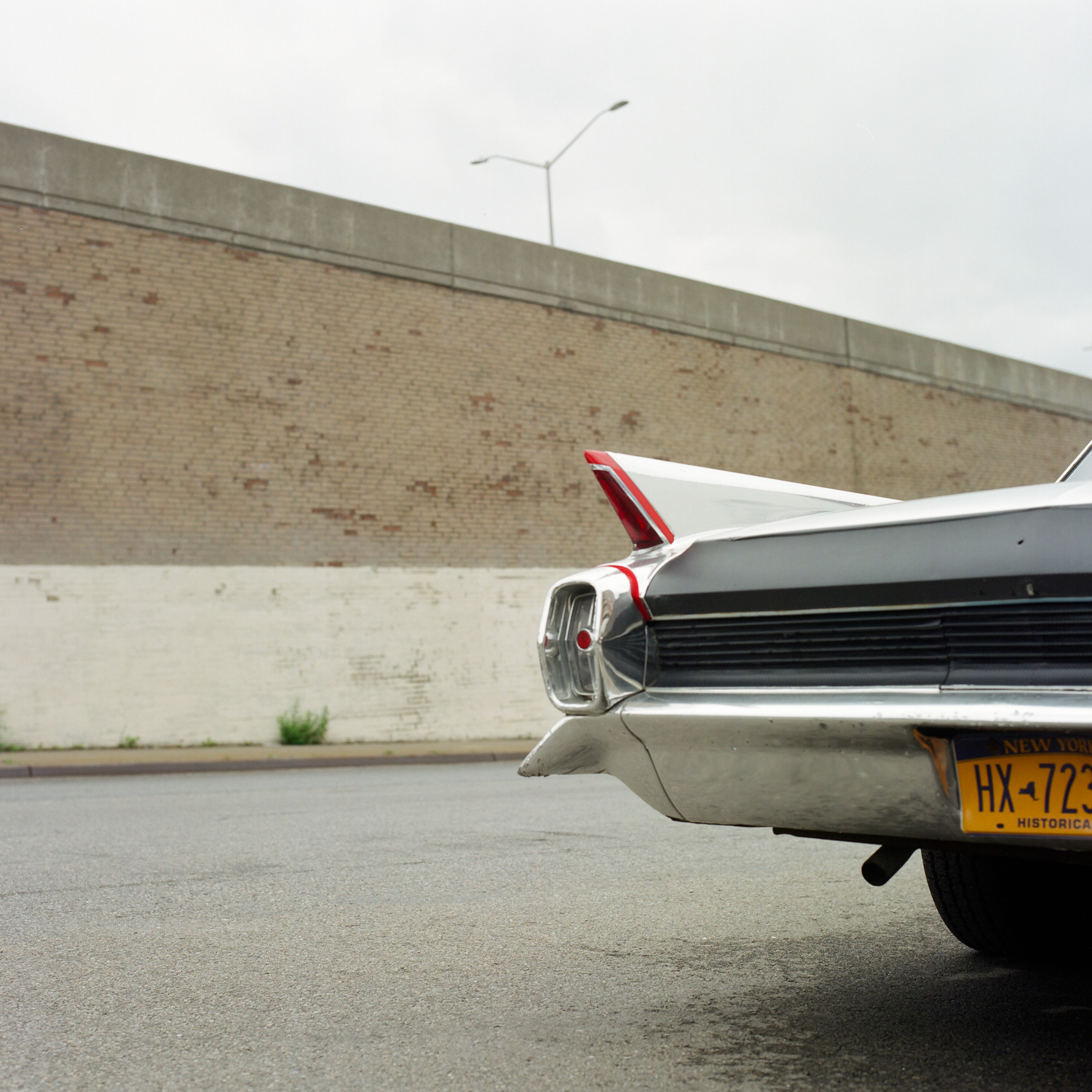 CAR_A-VINTAGE-CLASSIC-CAR-ACCENTUATES-ITS-ANGLES-ON-A-STREET-CORNER-IN-BROOKLYN