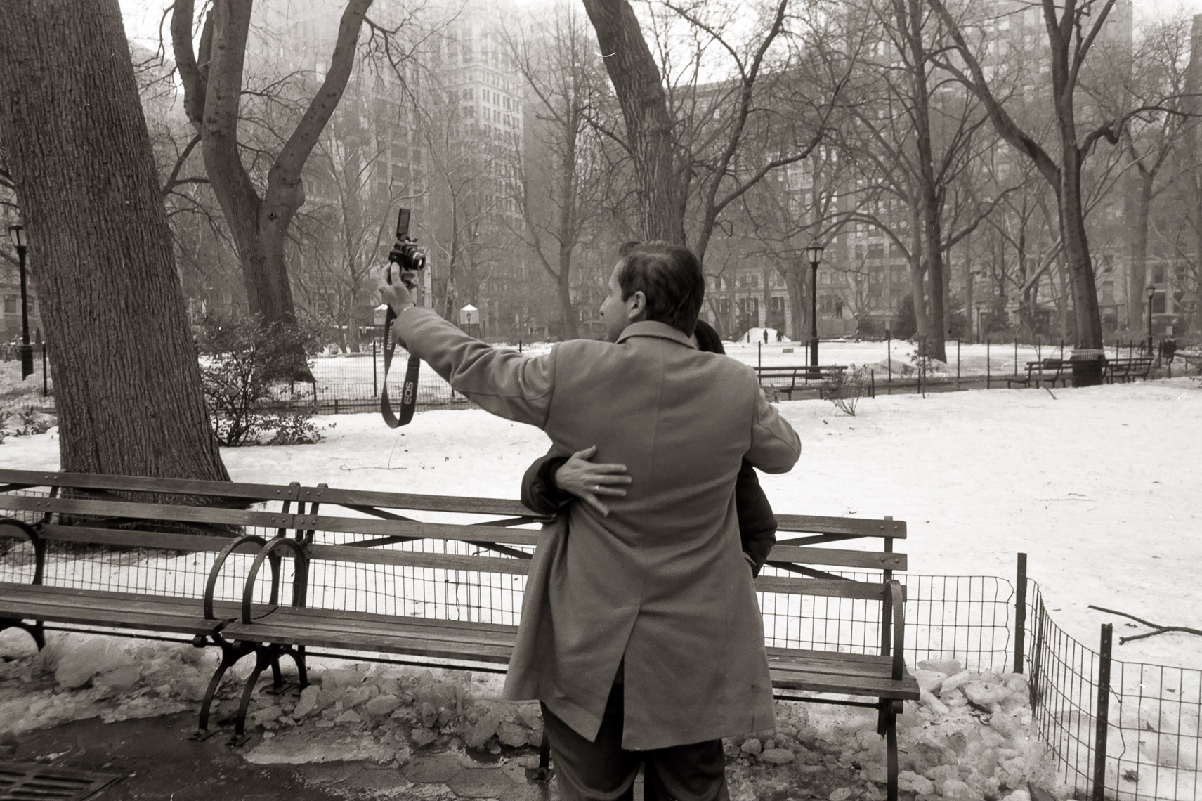 A couple take a self-portrait in Madison Square Park in New York City