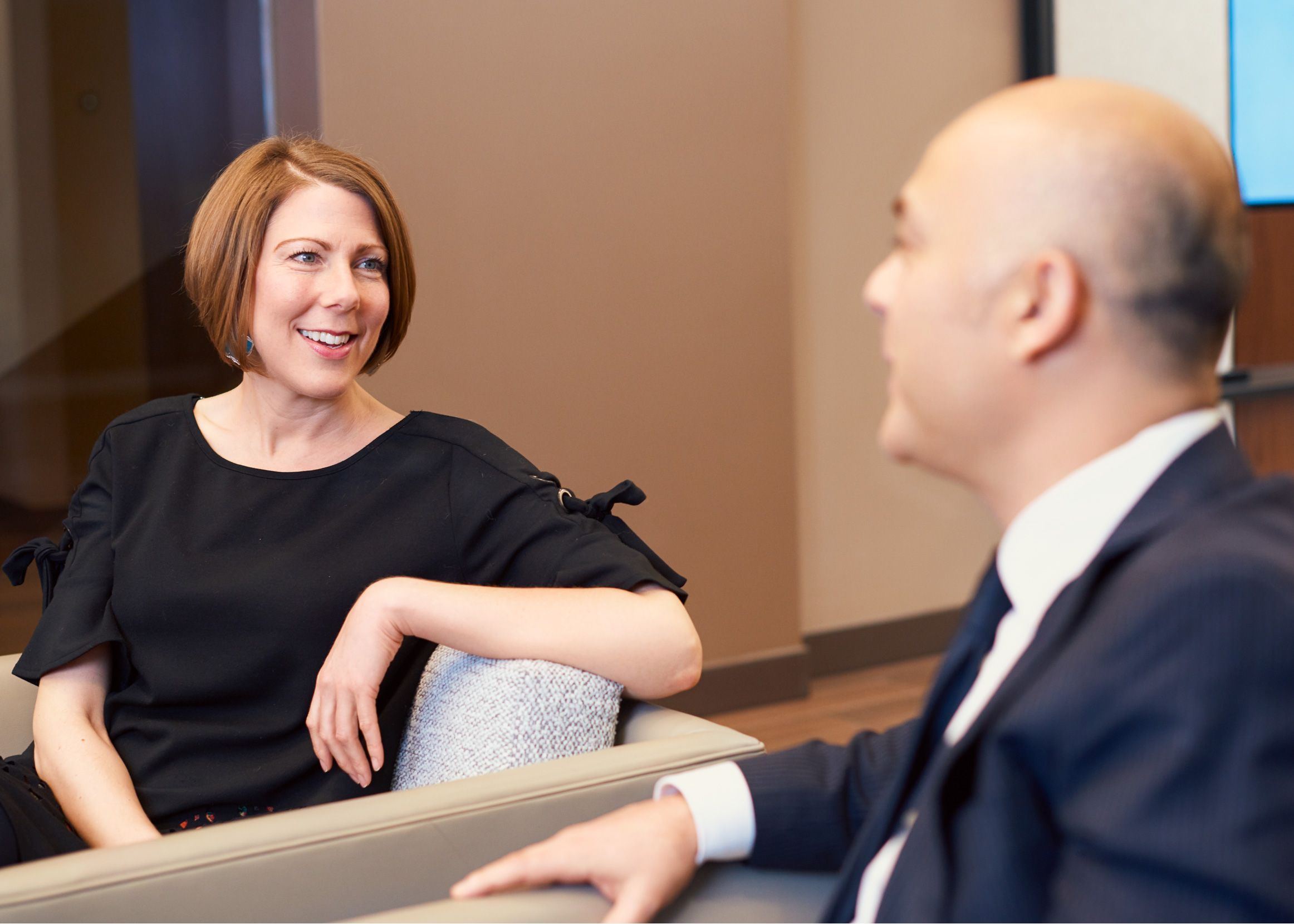 COLLEAGUES SHARE JOKES AT THE  GIS OFFICES OF BOA IN CHICAGO