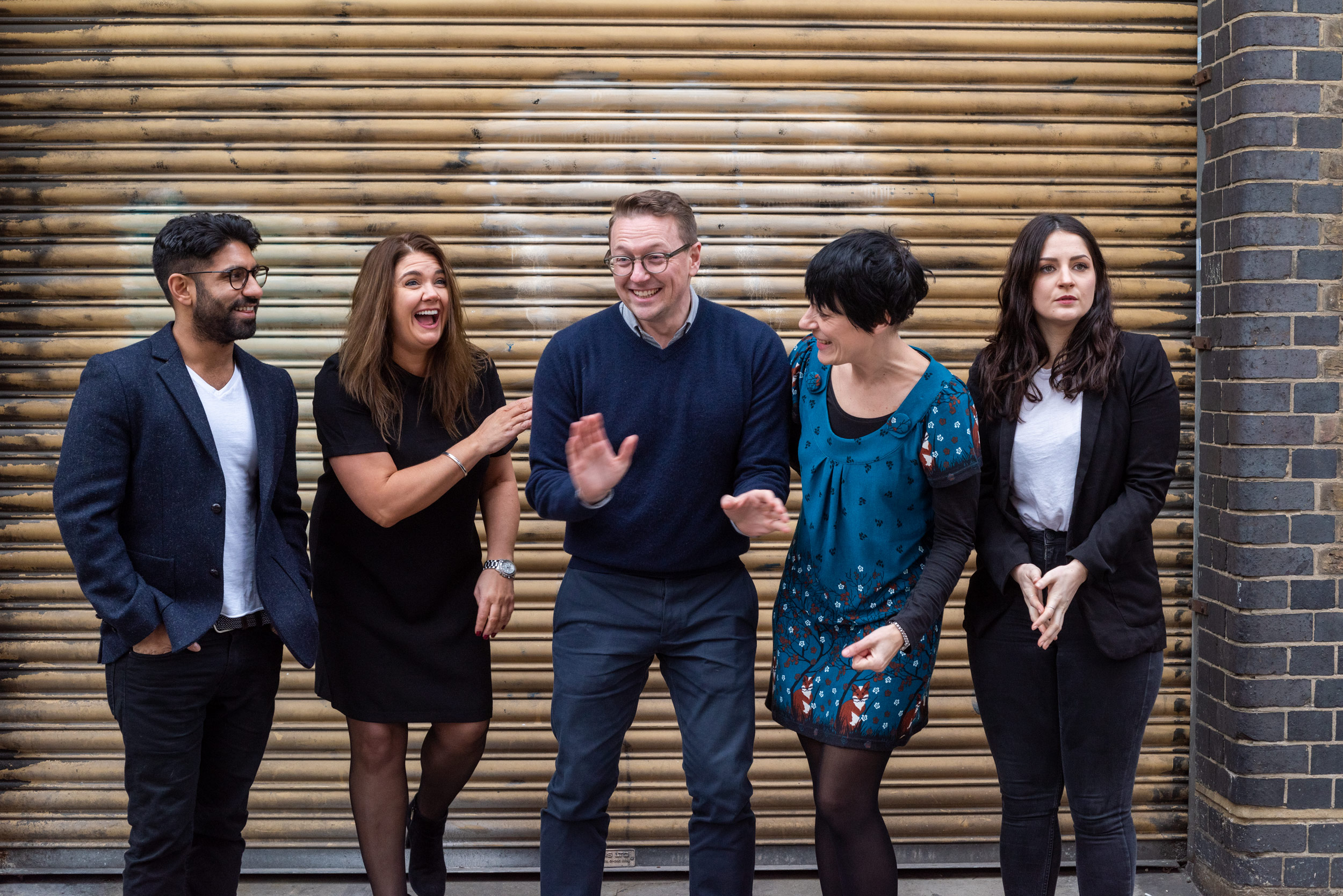 A FUNNY OUTTAKE GROUP POSED SHOT OF THE TEAM MEMBERS OFTHE CREATIVE RECRUITMENT AGENCY OWL INC 