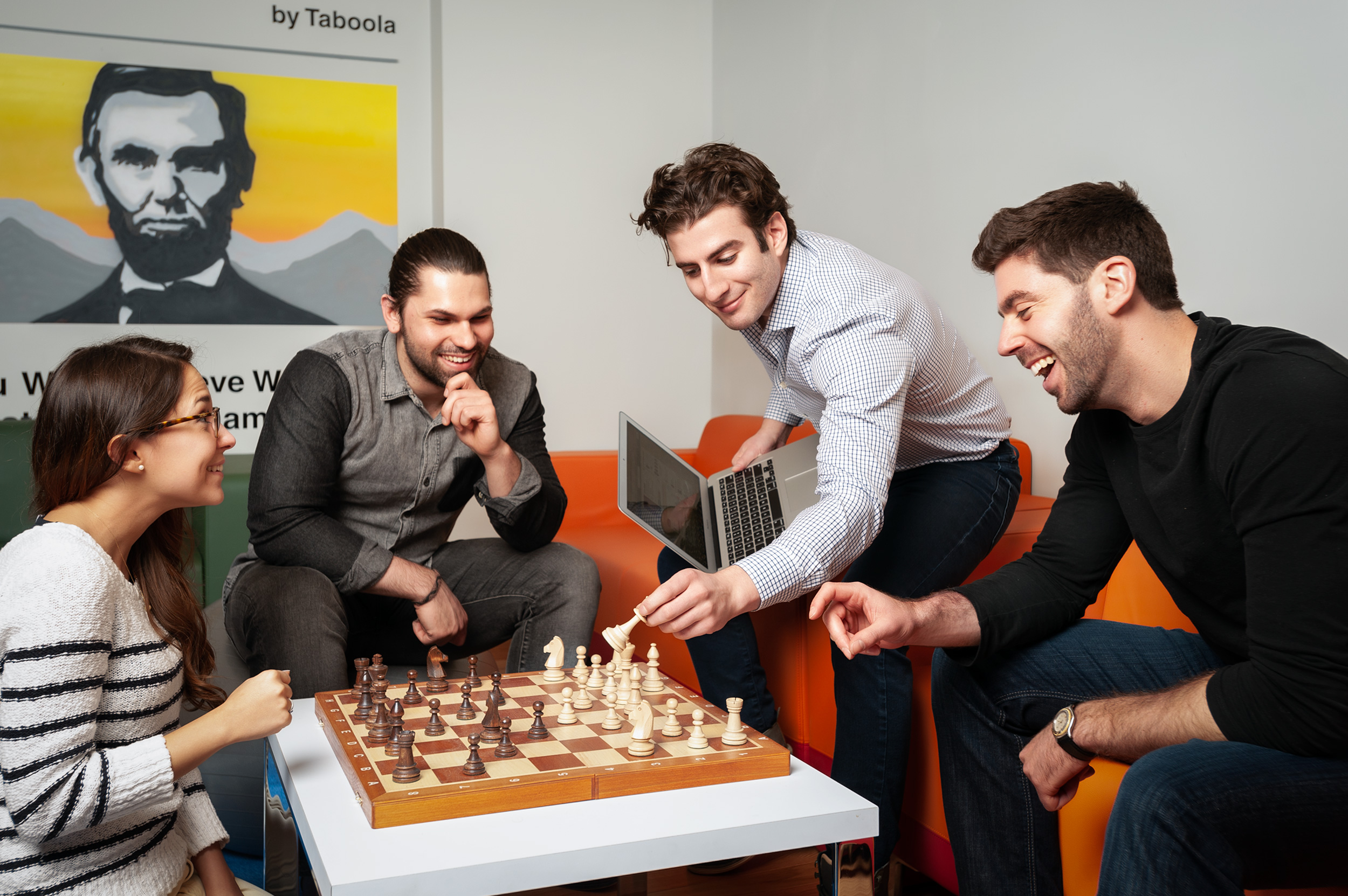 TEAM MEMBERS  TAKE A BREAK AND PLAY CHESS AT TABOOLA OFFICES